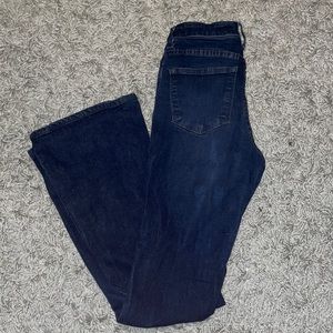 Classic midrise boot cut. From Kancan size W26 L32